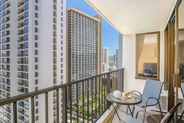 Enjoy having coffee on your balcony with city views.