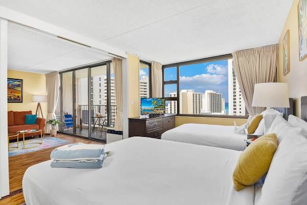 Have a comfortable sleep in your bedroom with 1 queen-size and 1 full-size bed and a flat-screen TV.