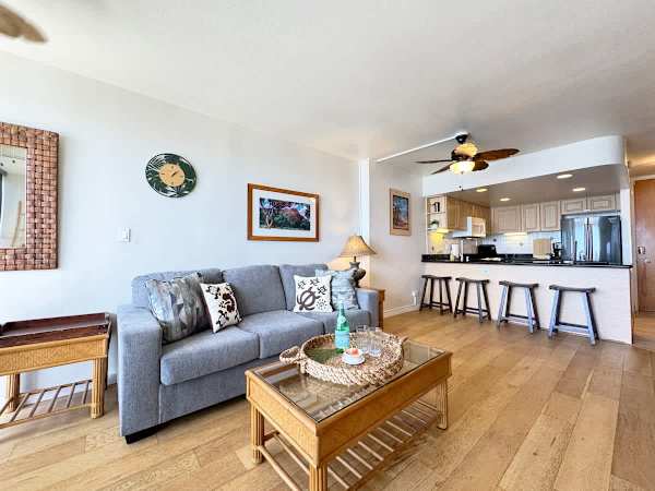 Sink into comfort on our cozy couch, perfectly positioned just steps from the dining area. It's the ideal setup for seamless relaxation and dining.