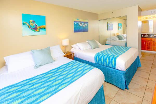 Bedroom with cable TV and sliding door that can be closed for privacy