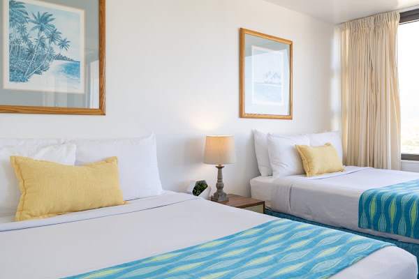 The bedroom features queen-size and full-size beds!