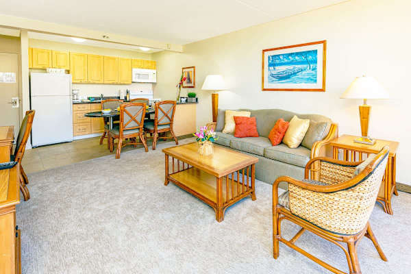 Open living area with a fully equipped kitchen and comfortable seating.
