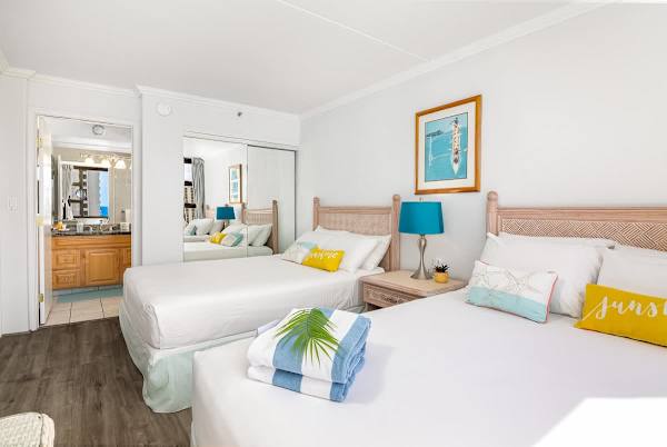 Relax in your bedroom with 2 queen-size beds