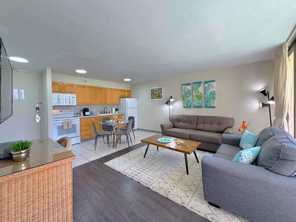 Come on in and relax! This spacious open-concept condo features a couch and pull-out sleeper sofa, and a fully-equipped kitchen with a dining area, all set and ready for your stay!