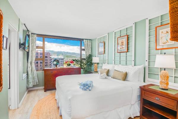 Have a restful night's sleep in your bedroom with a King-size bed, and beautiful mountain views.