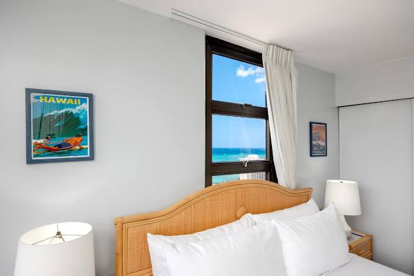 Wake up to breathtaking partial ocean views and a vibrant blue sky right from your bedroom window, offering a serene start to your day.