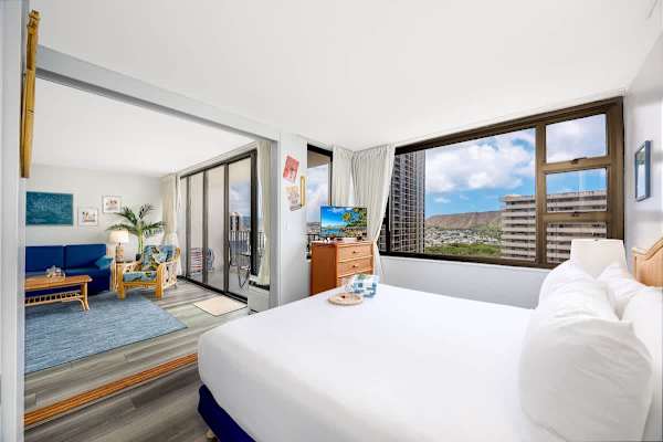 Enjoy the beautiful view of Diamond Head Mountain while lying on your king-size bed in the bedroom.