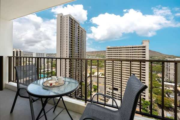 Balcony seating w/ small table, perfect for morning coffee outdoors