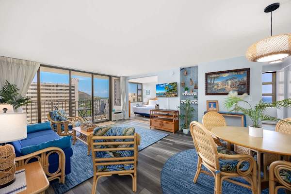 Experience ultimate comfort and breathtaking views in this spacious open-concept living area, seamlessly blending a vibrant lounge, dining space, a cozy bedroom, and a balcony with scenic views.