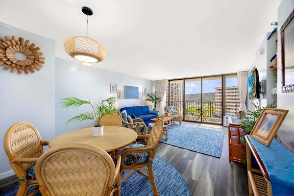 Wake up to the iconic beauty of Waikiki with a captivating view from your private balcony, showcasing the stunning cityscape, a glimpse of the ocean, and the majestic presence of Diamond Head.