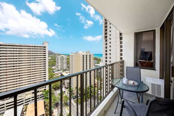 Savor your morning coffee or evening cocktails on your private balcony, offering panoramic views of the city, mountains, and the sparkling ocean in the distance.