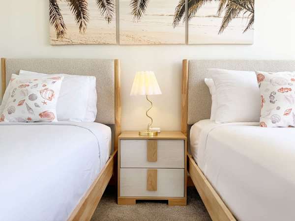 Perfect for relaxing, this bedroom features a king bed and a twin bed, ensuring everyone has a comfortable place to rest.