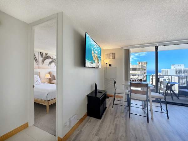 Step inside to a bright and open living area, where you can watch a movie or share a meal with a view of the ocean.