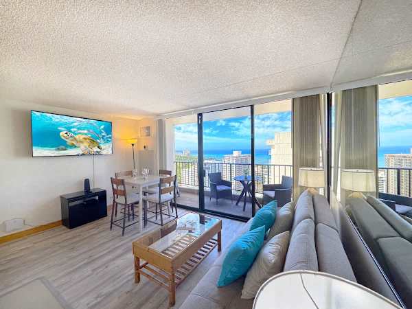 Enjoy your stay in your spacious living area with a 65" Smart TV, Central AC, and direct ocean-view lanai.