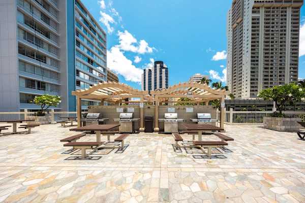 Enjoy outdoor dining and grilling in our shared BBQ area on the 6th floor, fully equipped with multiple grills and picnic tables for your convenience.