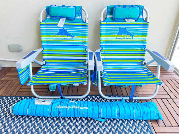 Be prepared for a day at the beach with two Tommy Bahama folding beach chairs and a beach umbrella provided for your convenience.