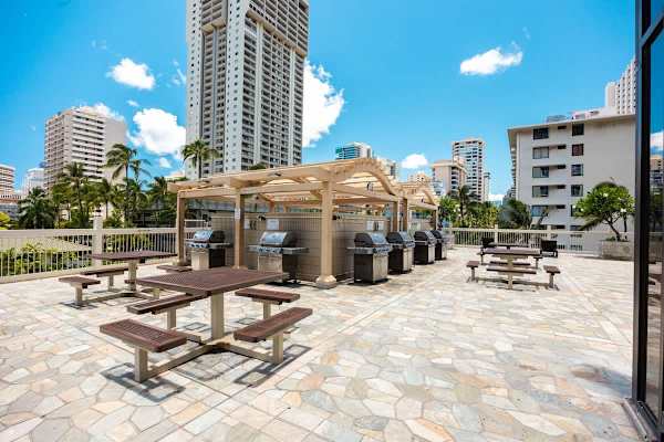 Enjoy outdoor dining and grilling on our shared BBQ area on the 6th floor, complete with multiple grills and picnic tables for your convenience.
