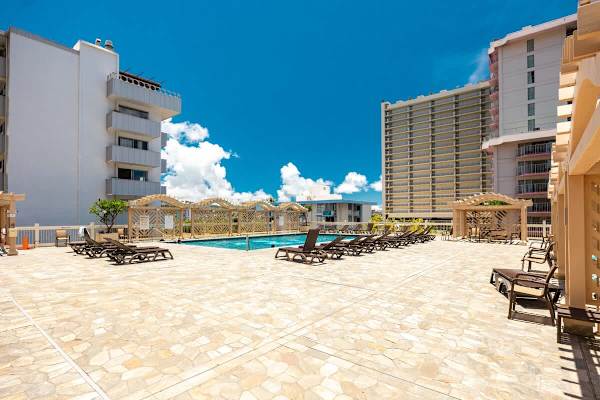 Sun lounge chairs and stylish cabanas -- perfect for enjoying the beautiful weather!