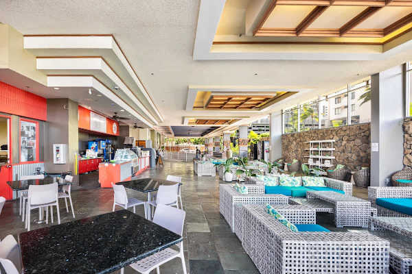 Relax in the inviting common area, featuring comfortable seating and a convenient snack bar!