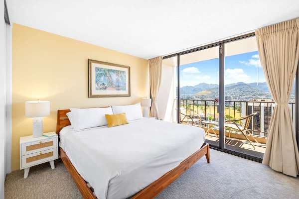 Wake up to spectacular mountain views from your bedroom featuring a King bed and direct sliding glass door access to the private balcony.