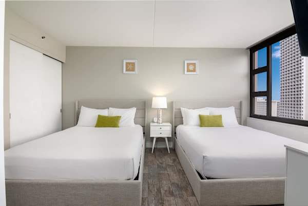 2 Queen-sized beds in the living room