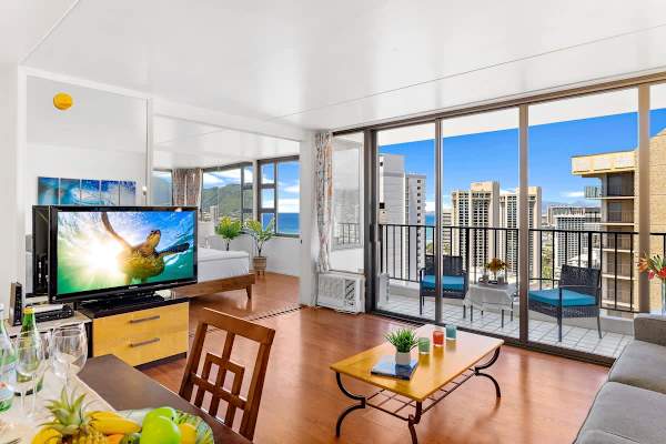 Modern living area with ocean views and balcony seating.