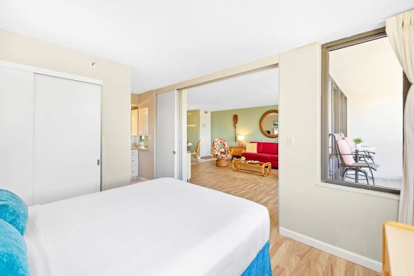 Bedroom separated from the living room by a sliding door