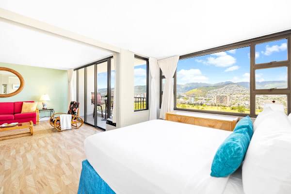 Bedroom separated from the living room by a sliding door