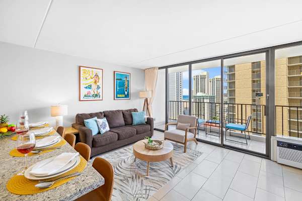 The living room has a pull-out sleeper sofa and dining area for 4!