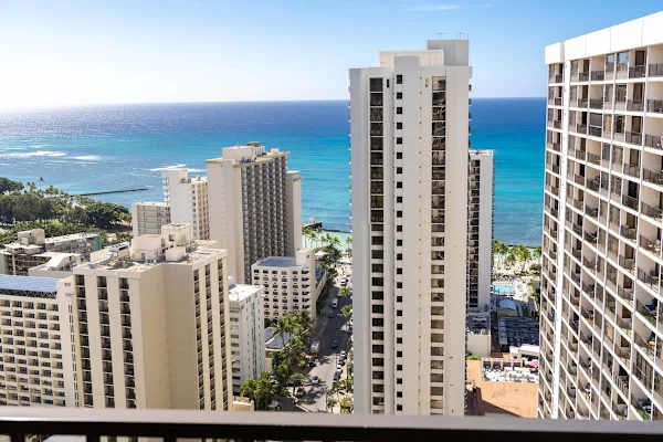 Elevate your stay with panoramic views that stretch from the bustling city streets to the endless blue horizon.