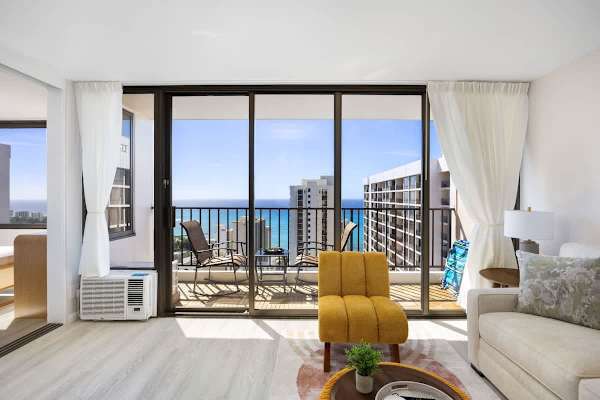 Slide open the doors to your private balcony and gaze out at the beautiful ocean views!