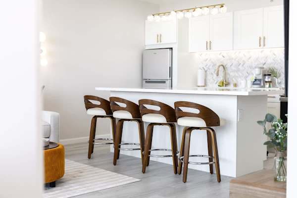 A chef-ready kitchen and spacious breakfast bar designed for seamless living and social mornings.