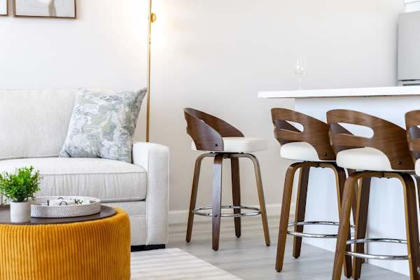 Enjoy casual dining in style with comfortable barstools that keep you connected to both the kitchen and the view.