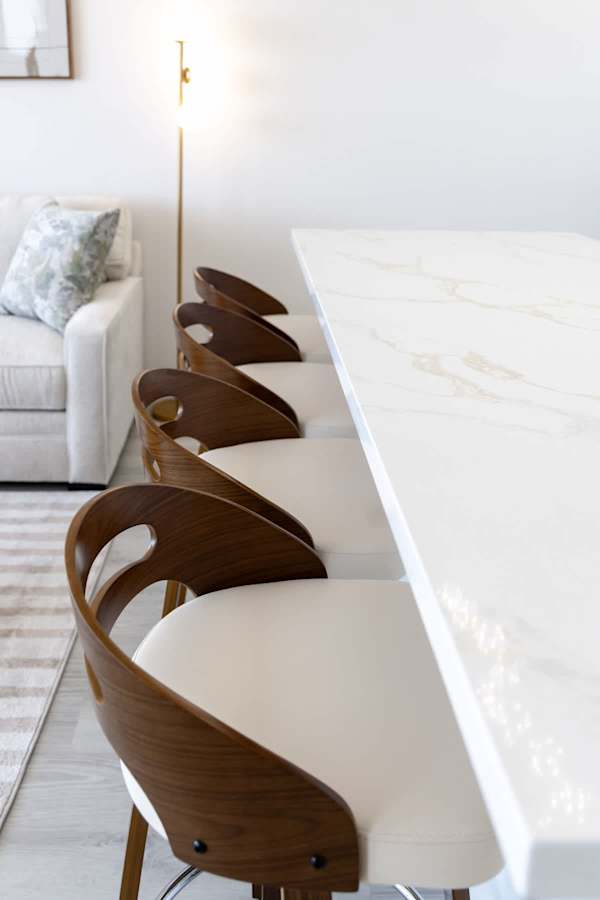 Share a meal with your friends/family in the sleek kitchen bar w/ 4 chairs.