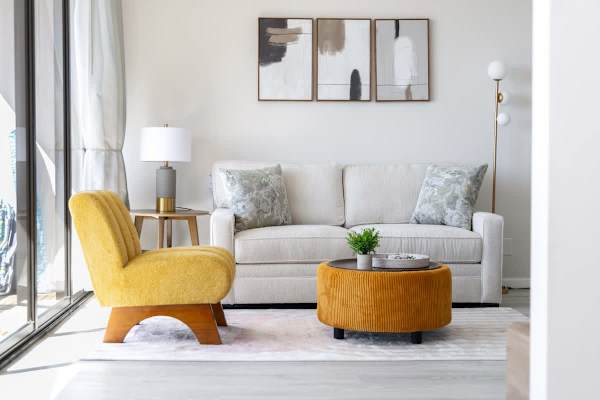 Relax in your chic and versatile living area that seamlessly blends modern design with a warm, welcoming atmosphere!