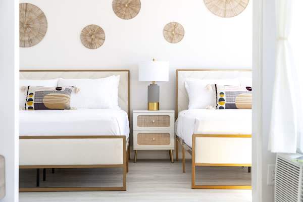 Relax in your bedroom with a queen and a full-size bed! The bedroom is separated from the living room by a sliding door.