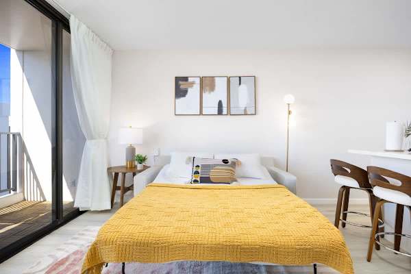 Relax in your newly renovated condo featuring a plush sofa bed and a private balcony for morning coffee!