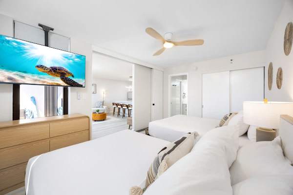 Have a relaxing moment in your bedroom with queen and full size beds, smart TV, ceiling fan, and easy access bathroom.