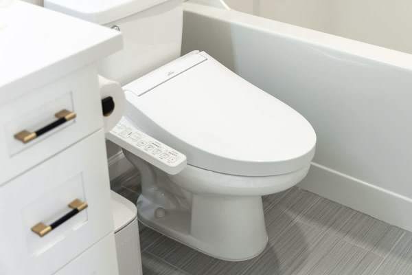 Experience a new level of comfort with our modern electronic bidet, adding a touch of high-end luxury to your stay.