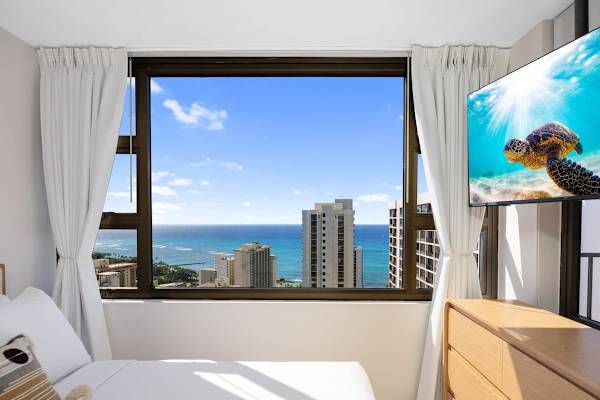 Wake up to paradise with breathtaking, panoramic ocean views framed perfectly right from your pillow.
