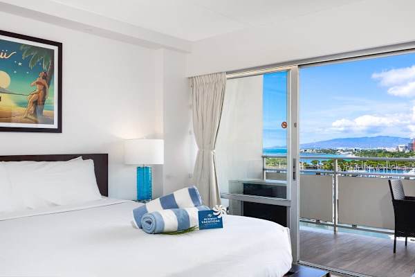 Feast your eyes on the beautiful and awesome views of the ocean and Ala Wai Yacht Harbor from your bed!