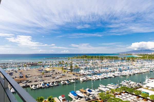 Savor the stunning, expansive views of the Ala Wai Yacht Harbor and the Pacific Ocean from your balcony!