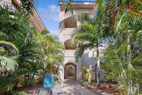 Tropical Courtyard Entrance & Arched Architectural Tower
