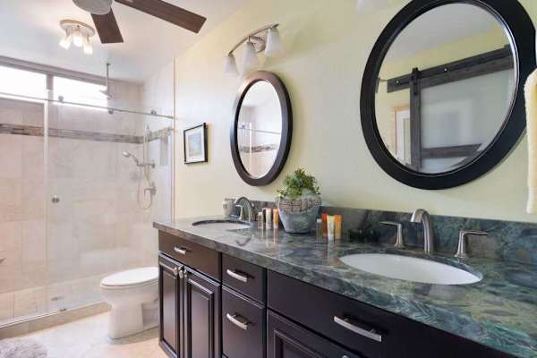 Spacious Bathroom with Large Double Vanity & Glass-Enclosed Shower