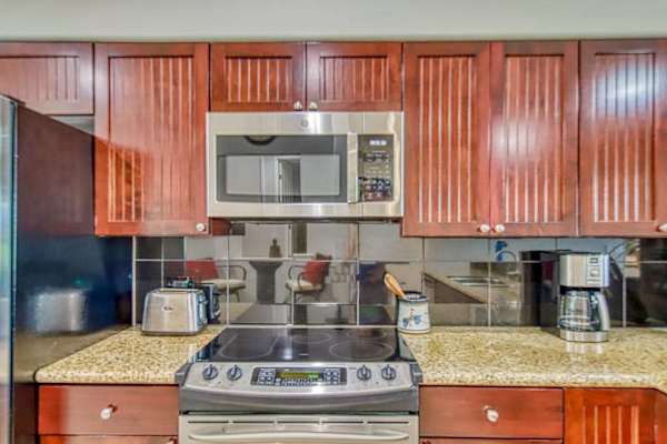 Modern kitchen with stainless steel appliances
