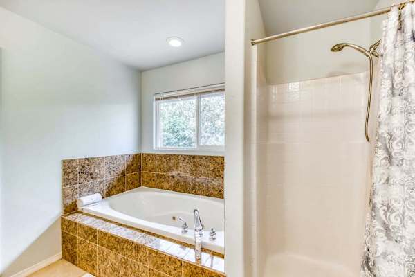 Full Bathroom With Soaking Tub