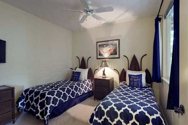 Cozy bedroom with two comfortable twin beds
