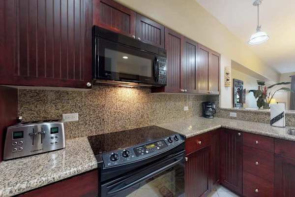 Fully equipped kitchen with modern appliances
