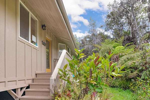 Welcoming Entry Surrounded by Lush Flora