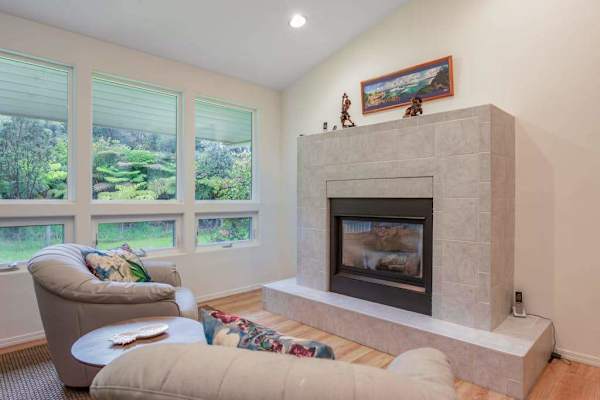 Cozy Fireplace Nook with Forest Views